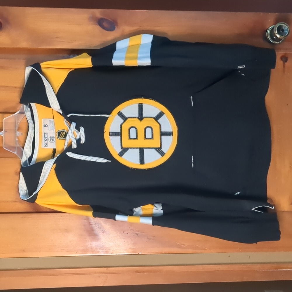 CCM*  long sleeve size s Bruins logo sweater, distressed look, jagged edges, raw